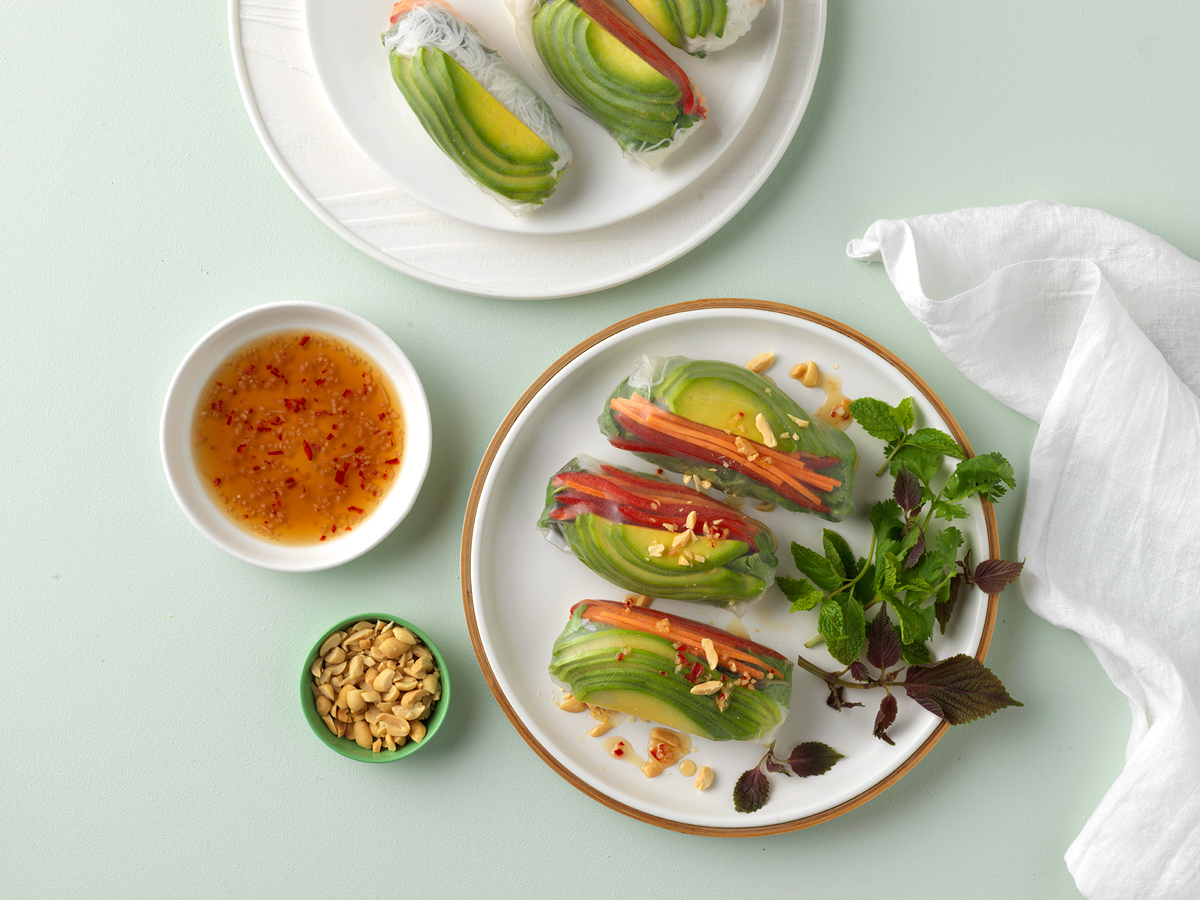 Rice Paper rolls with avocado, and spicy dipping sauce